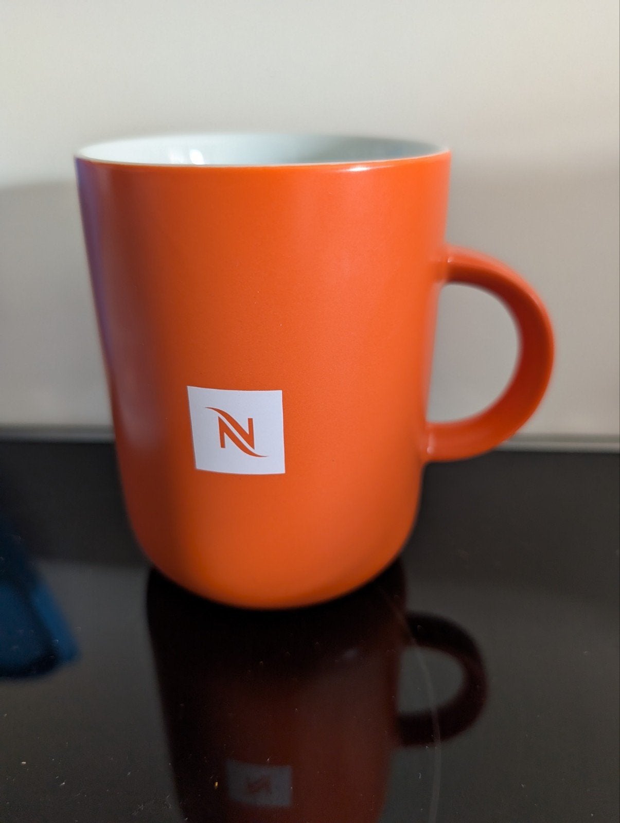 Nespresso beker Pantone Mandarin Orange, Overige materialen, Ophalen of Verzenden, Zo goed als nieuw, Overige stijlen