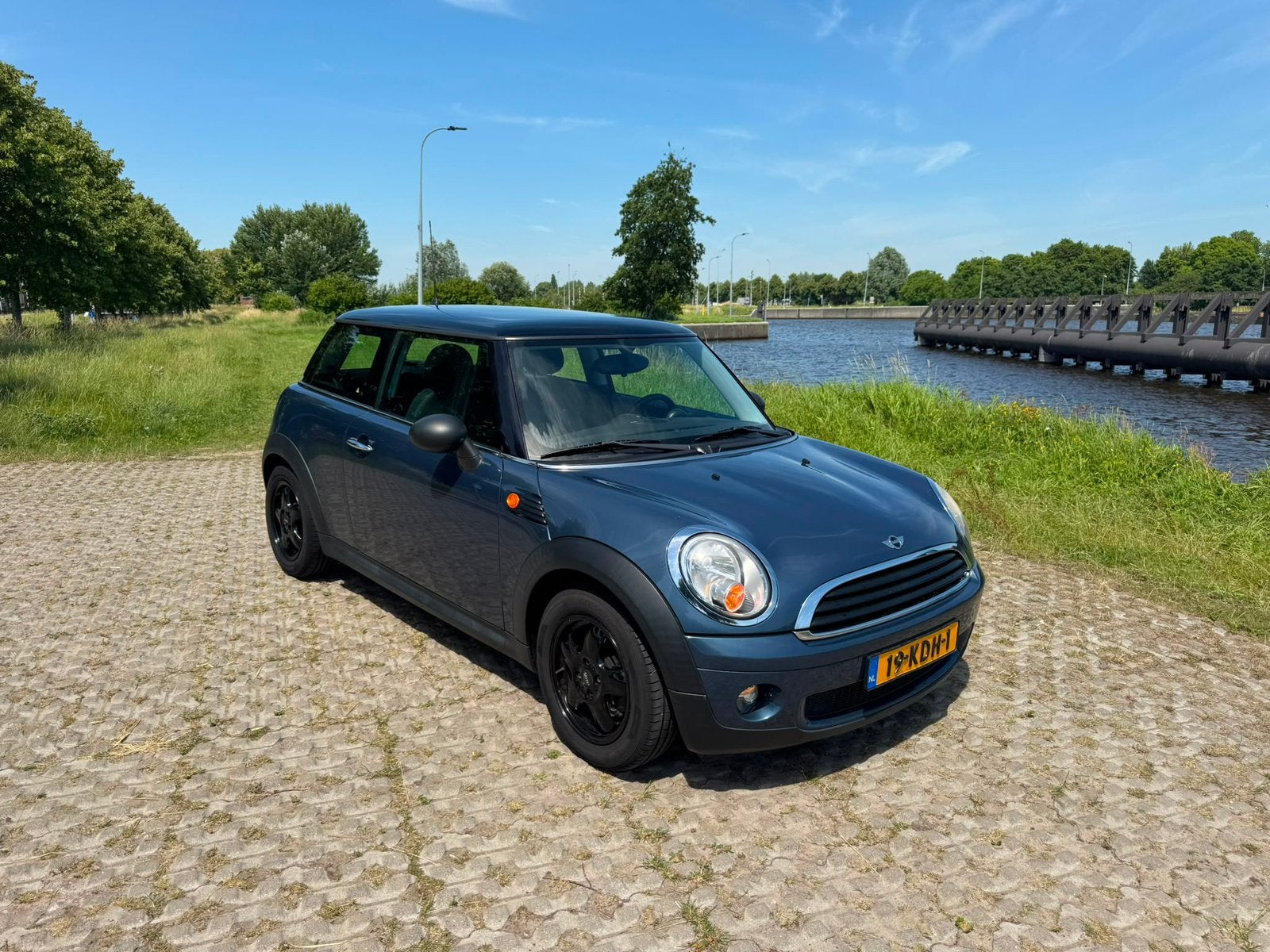 Mini (r56) 1.4 95pk 2009 Blauw, Auto's, Voorwielaandrijving, 49 €/maand, Origineel Nederlands, 19 km/l