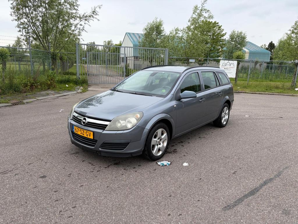 Opel Astra 1.4 16V St.wgn. 2006 Grijs, Auto's, Opel, Voorwielaandrijving, 4 cilinders, Origineel Nederlands, Stationwagon