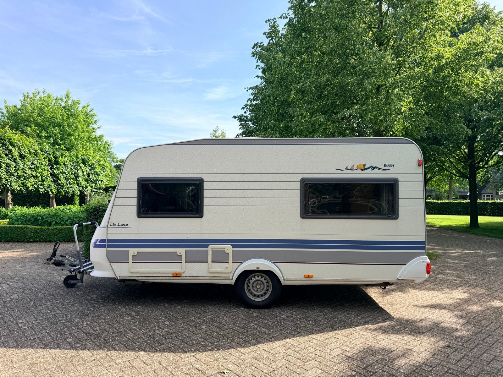 Hobby de Luxe 440 uit 1998 met voortent en fietsenrek, Vast bed, Hobby, Treinzit, Particulier