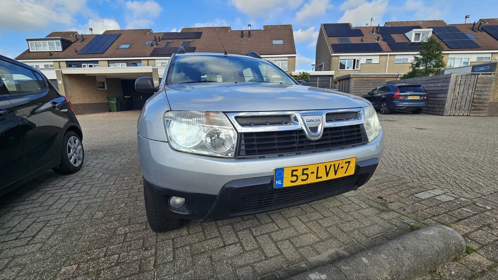 Dacia Duster 1.6 16V 4X2 2010 zilver, Auto's, Stof, Zwart, 4 cilinders, Duster