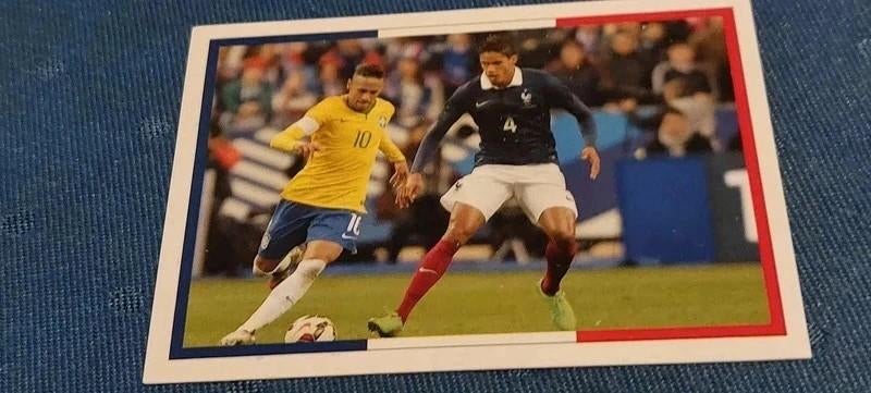 Panini/Sticker : Raphael Varane-Neymar JR., Verzenden, Nieuw, Buitenlandse clubs, Poster, Plaatje of Sticker