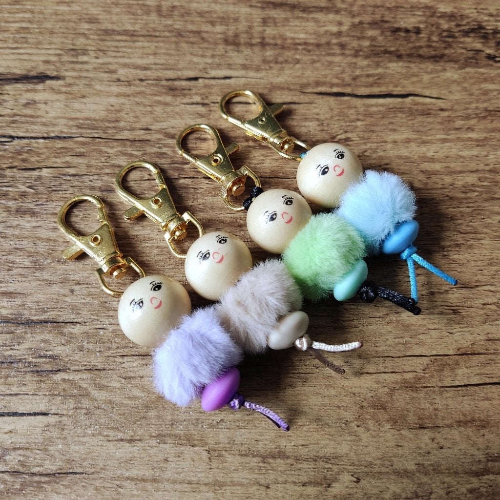 Tashanger / Sleutelhanger gelukspoppetje fluffy goudkleur, Verzenden, Nieuw, Hanger