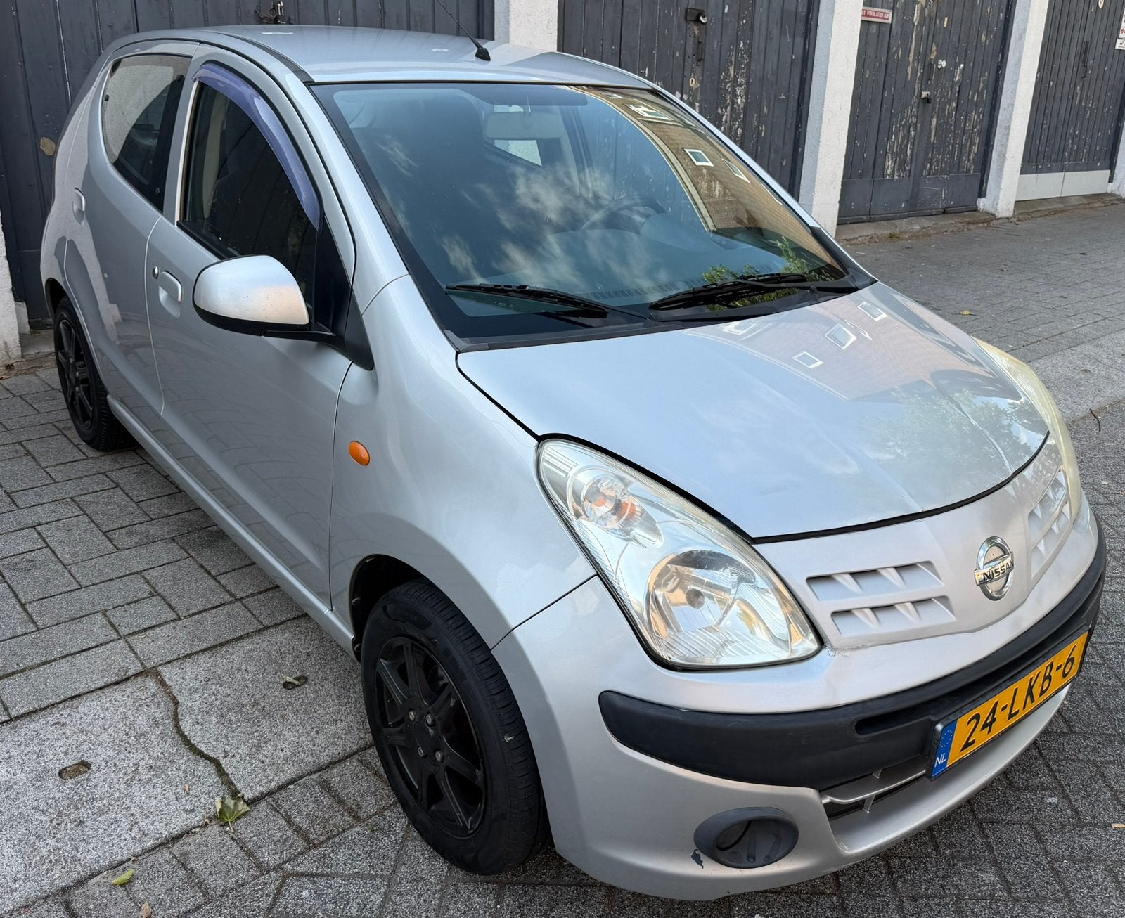 Nissan Pixo 1.0 50KW 5-deurs Airco 2010 Grijs 2e eigenaar!, Auto's, Voorwielaandrijving, 200 kg, 4 stoelen, Origineel Nederlands