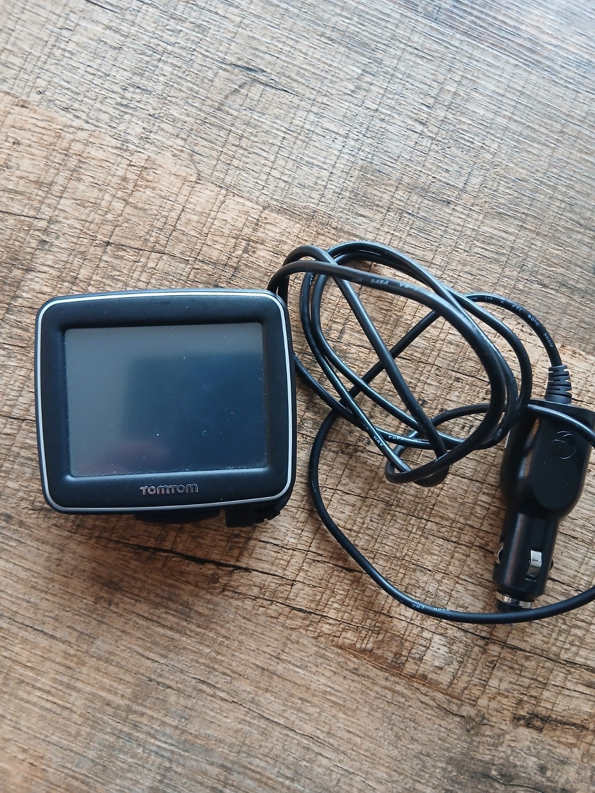 TomTom navigatiesysteem met autolader, Ophalen of Verzenden, Gebruikt