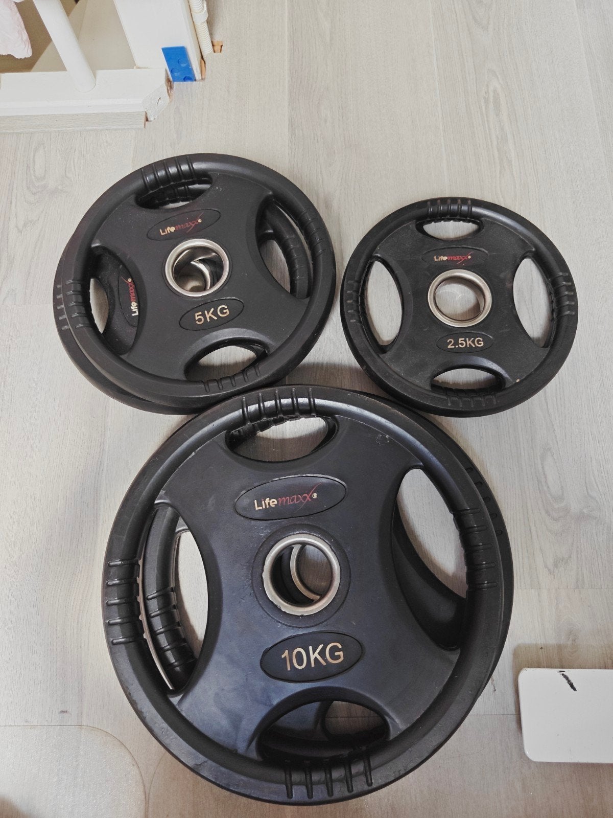 LifeMaxx Olympische rubberen halterschijven 50mm, Sport en Fitness, Fitnessmaterialen, Ophalen, Zo goed als nieuw, Benen, Halterschijven