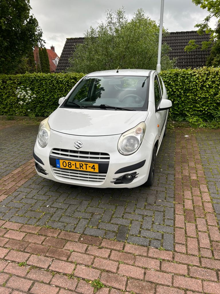 Suzuki Alto 1.0 2010 Wit, Auto's, Voorwielaandrijving, Stof, 200 kg, 4 stoelen