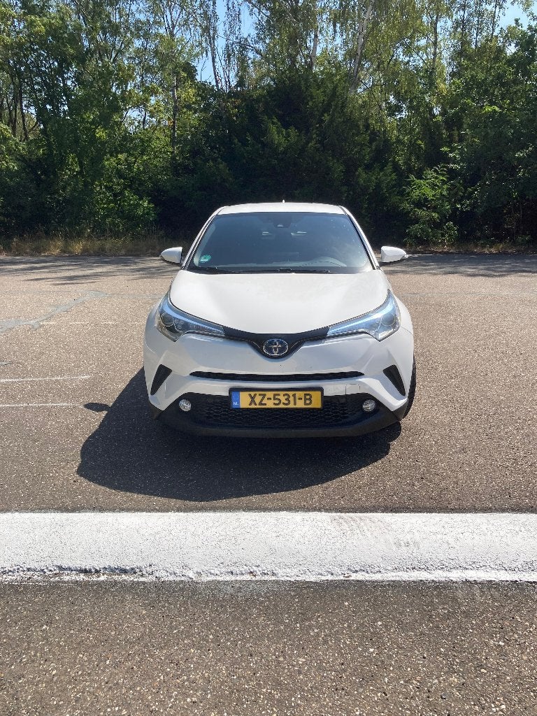 Toyota C-HR 1.8 Hybrid 122pk CVT 2017 Wit, Stof, 725 kg, 4 cilinders, Wit