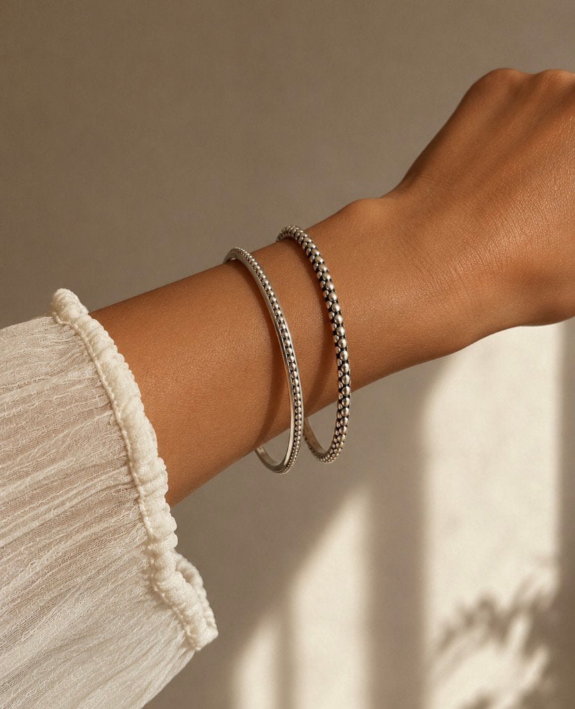 Vintage zilverkleurige bangles, Ophalen of Verzenden, Zo goed als nieuw, Zilver, Overige materialen