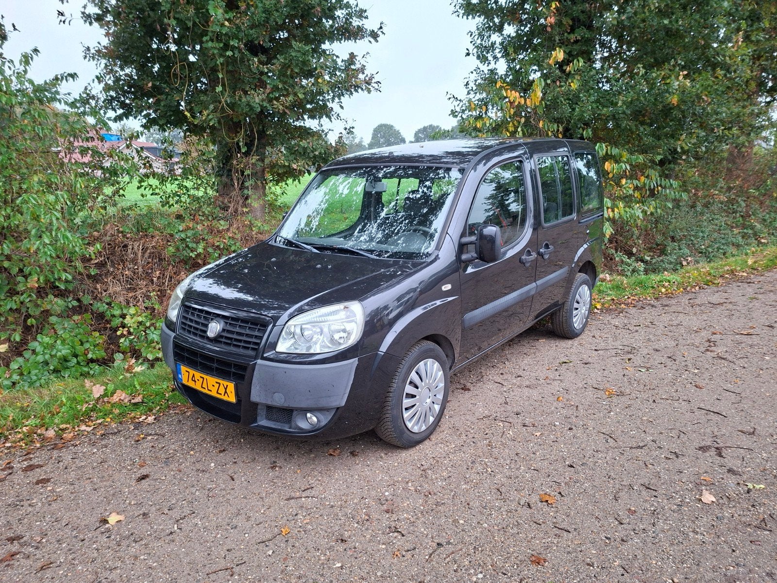 Fiat Doblo 1.4 57KW 2008 Zwart. 7 pers.uitvoering. APK NIEUW, Auto's, Voorwielaandrijving, Stof, 7 stoelen, Zwart