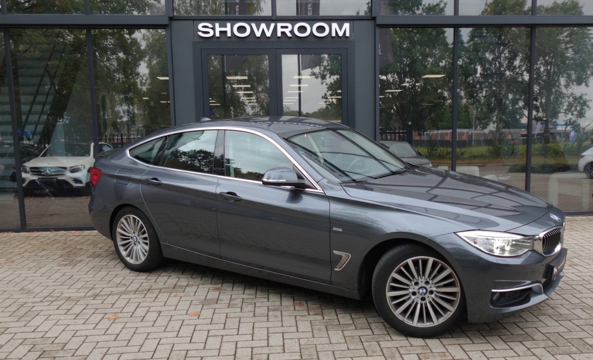 BMW 3-serie Gran Turismo 320i High Executive NAVI LEDER PCD, Auto's, BMW, Automaat, Achterwielaandrijving, Gebruikt, Euro 6