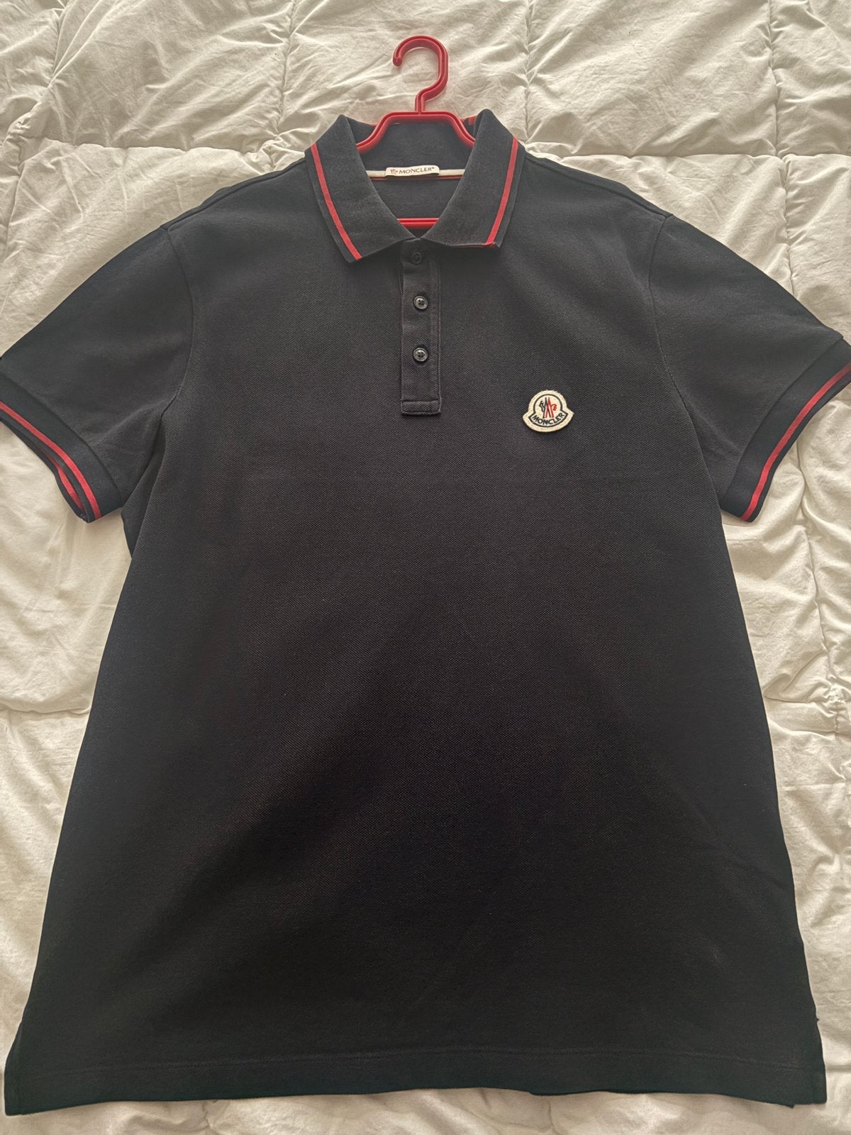 Moncler polo, Ophalen of Verzenden, Zo goed als nieuw, Maat 48/50 (M), Zwart