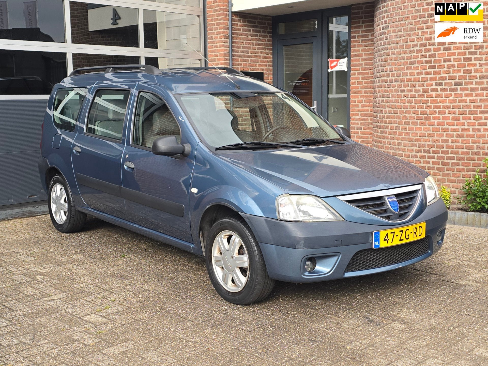 Dacia Logan MCV 1.6-16V Lauréate 7p. Airco |Apk, Auto's, Dacia, Gebruikt, Elektrische ramen, Blauw, 7 stoelen