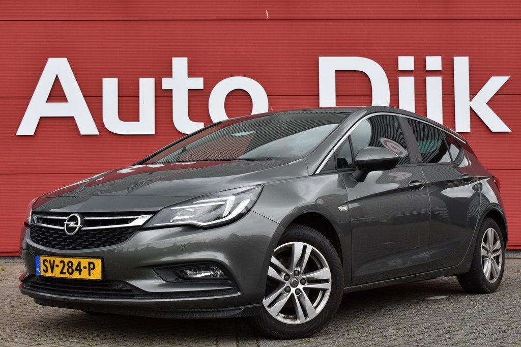 Opel Astra 1.4 Online Edition Carplay | Navi | Trekhaak | DA, Auto's, Opel, Stof, Gebruikt, 4 cilinders, 620 kg