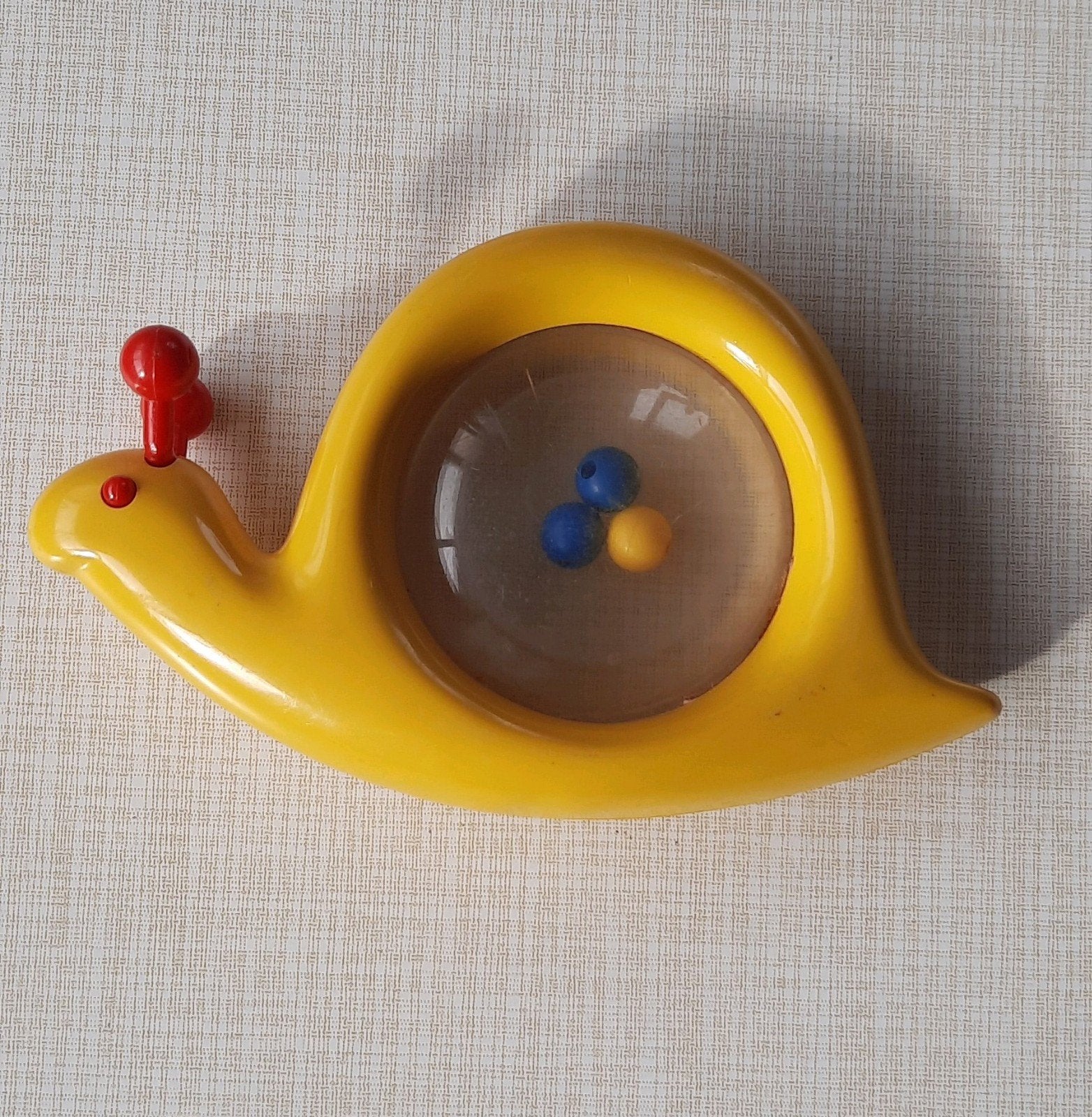 Rammelaar slak Ambi Toys babyspeelgoed, Kinderen en Baby's, Speelgoed | Babyspeelgoed, Ophalen of Verzenden