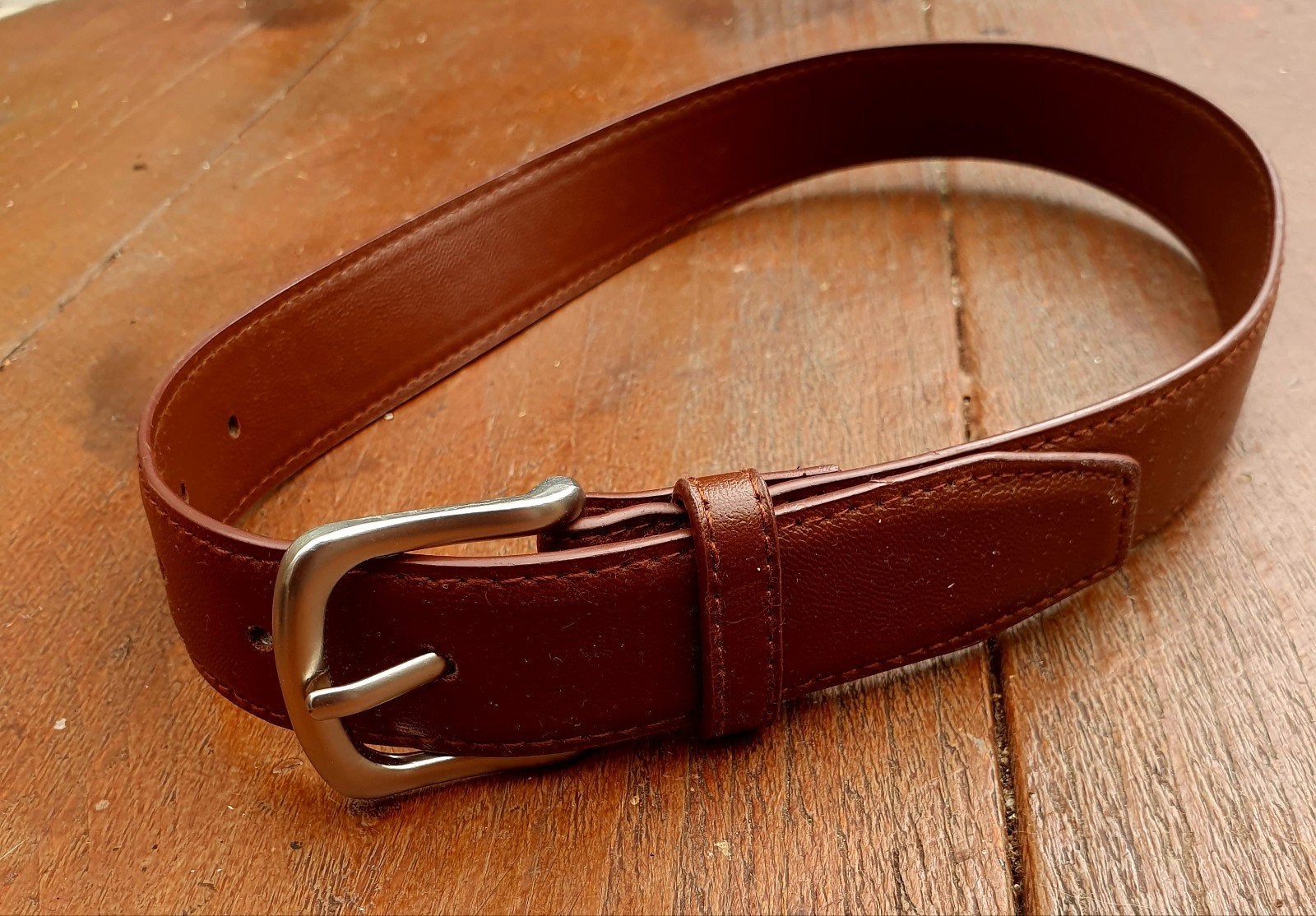 Bruine riem 55cm, Ophalen of Verzenden, Zo goed als nieuw, Jongen of Meisje