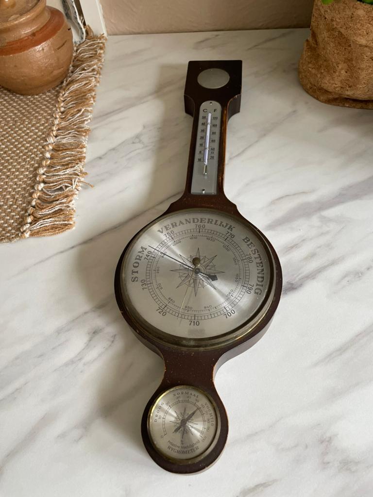 Antieke barometer thermometer, Ophalen
