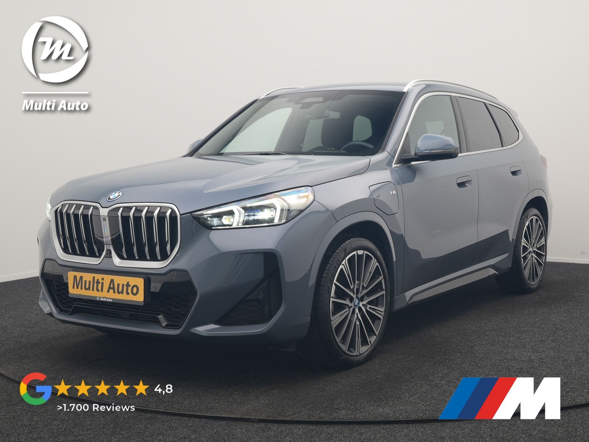 BMW X1 xDrive30e M Sport PHEV 326pk Dealer O.H. | Trekhaak A, Auto's, Zwart, Plug-in hybride, Bedrijf, Automatische klimaatregeling