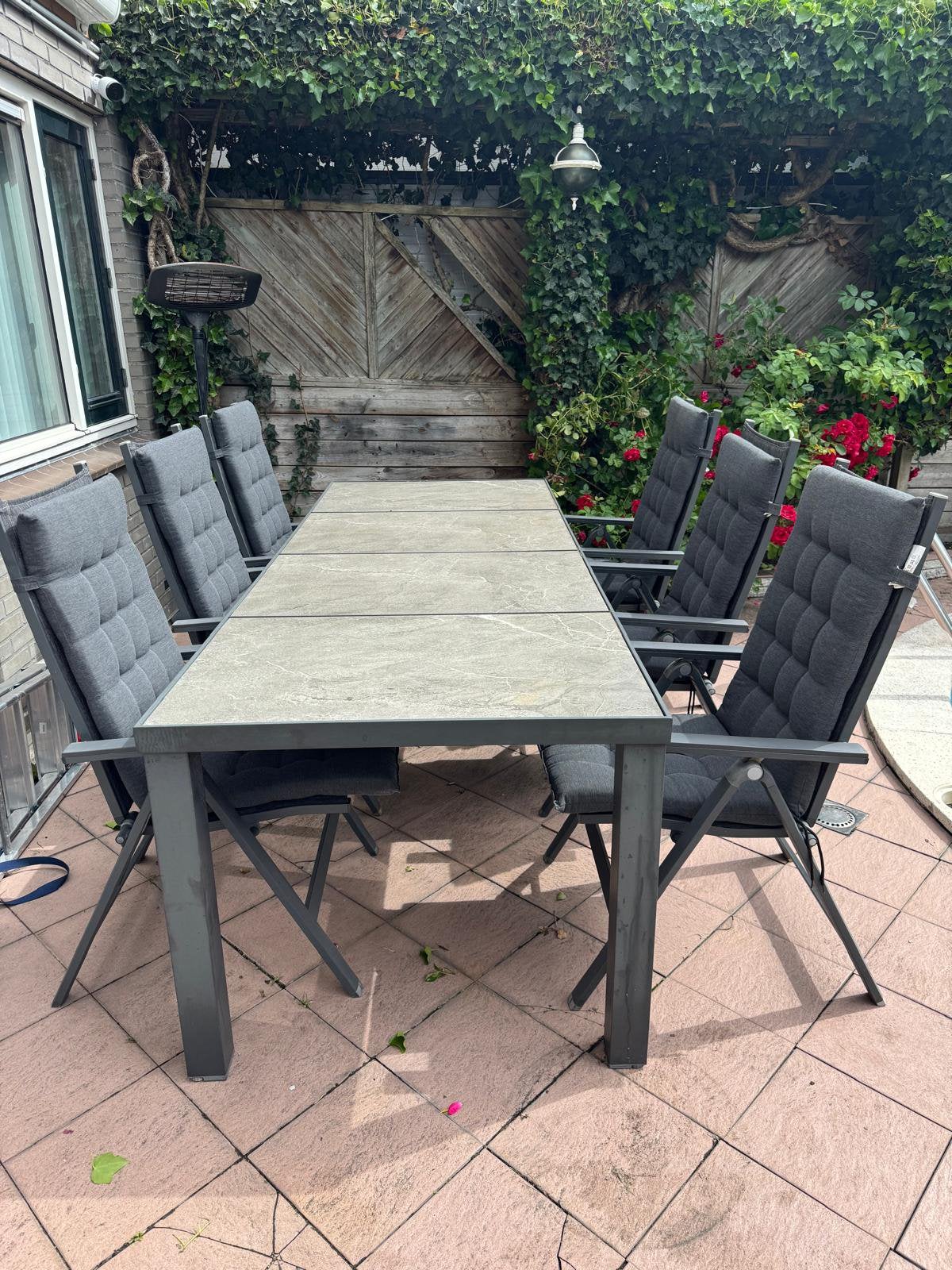 Grote tuintafel antraciet met 6 stoelen en kussens, Ophalen, Overige materialen, Gebruikt, Eettafel