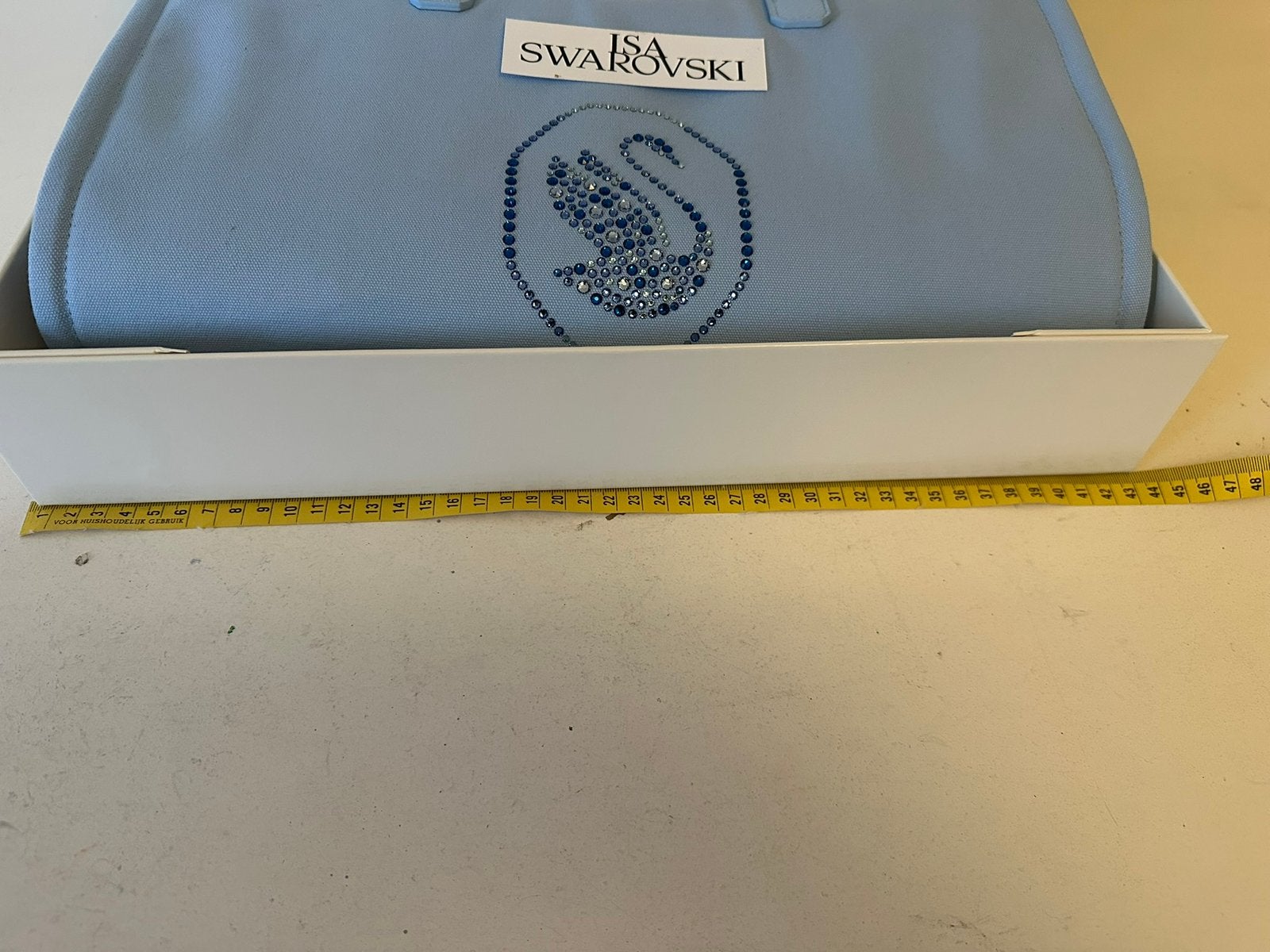 Nieuw in doos , Mooie grote blauwe tas van Swarovski, Ophalen of Verzenden, Nieuw, Figuurtje