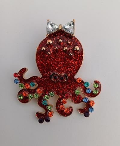Goudkleurige broche inktvis rood met strikje  , Verzenden, Nieuw, Rood, Overige materialen