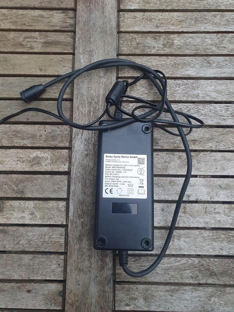 E-bike acculader 36V Li-ion - Derby Cycle Werke, Verzenden, Gebruikt
