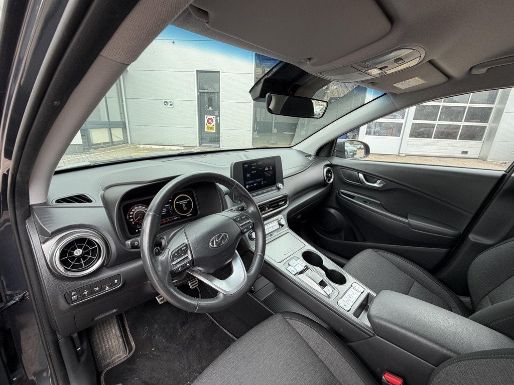 Hyundai Kona EV Fashion 64 kWh | 204 PK | SOH 95% | Adaptive, Auto's, Hyundai, Stof, Gebruikt, Overige kleuren, 204 pk