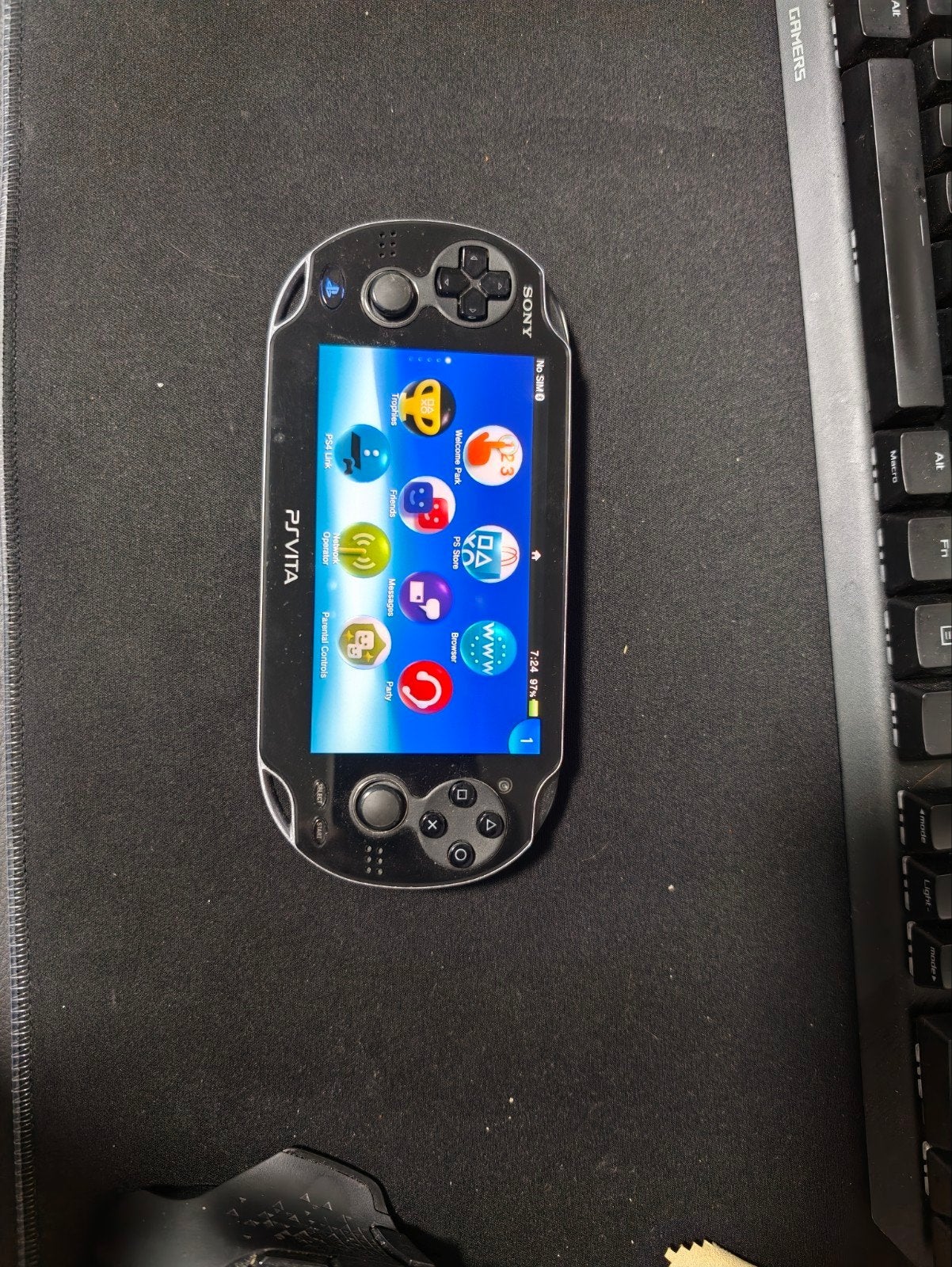 PS Vita OLED Model 1 (gsm) + Mortal Kombat, Ophalen of Verzenden, Zo goed als nieuw, Zwart, Met games