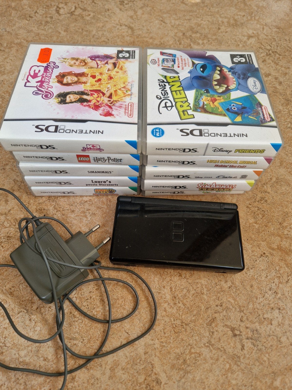 Zwarte nitendo ds, met oplader & 10 spellen., Spelcomputers en Games, Games | Nintendo DS, 1 speler, Ophalen, Zo goed als nieuw