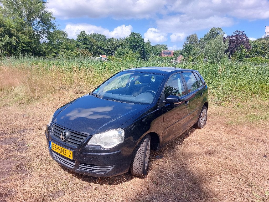 Volkswagen Polo 1.4 16V 59KW 2009 Zwart, Auto's, Voorwielaandrijving, 40 €/maand, 4 cilinders, Zwart