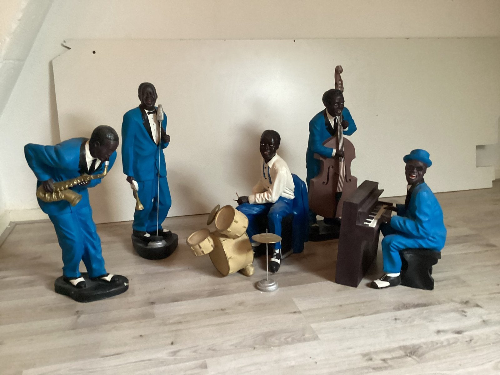 Vijf beelden die een jazzband uitbeelden., Ophalen, Gebruikt, Mens