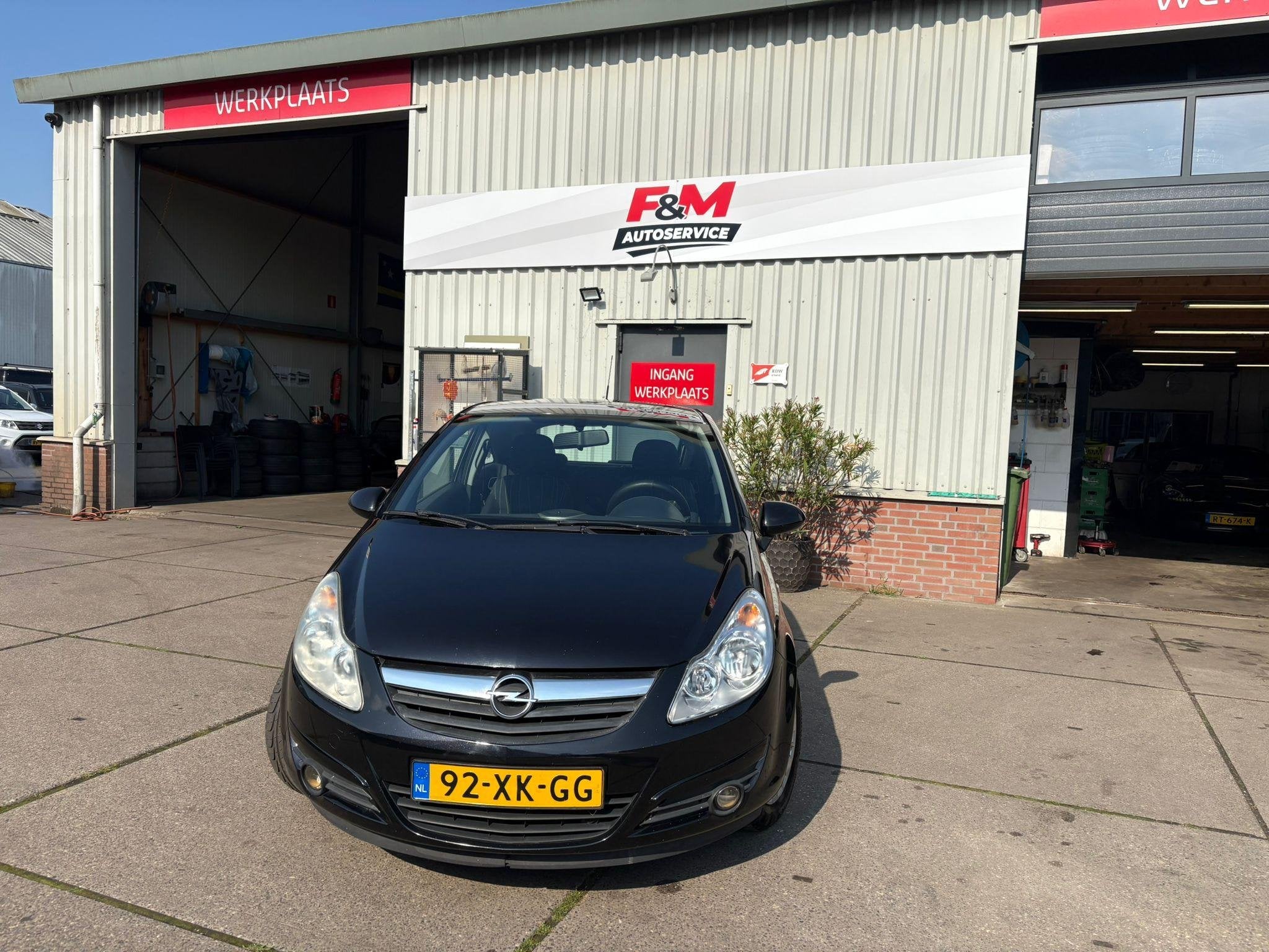 Opel Corsa 1.2-16V Enjoy Airco, Auto's, Voorwielaandrijving, 4 cilinders, 1229 cc, Zwart