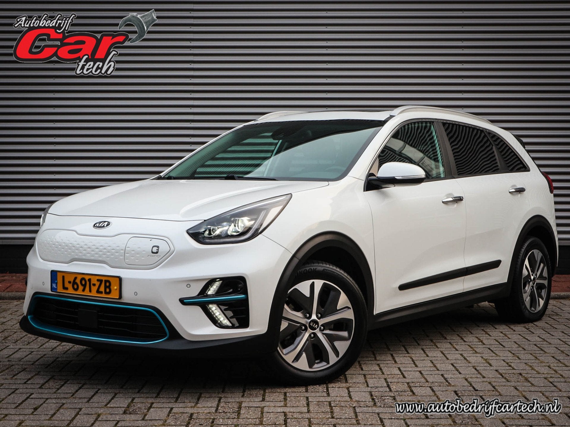 Kia e-Niro DynamicPlusLine 64 kWh Clima | Cruise | Navi | Op, Auto's, Gebruikt, Zwart, 1712 kg, Leder en Stof