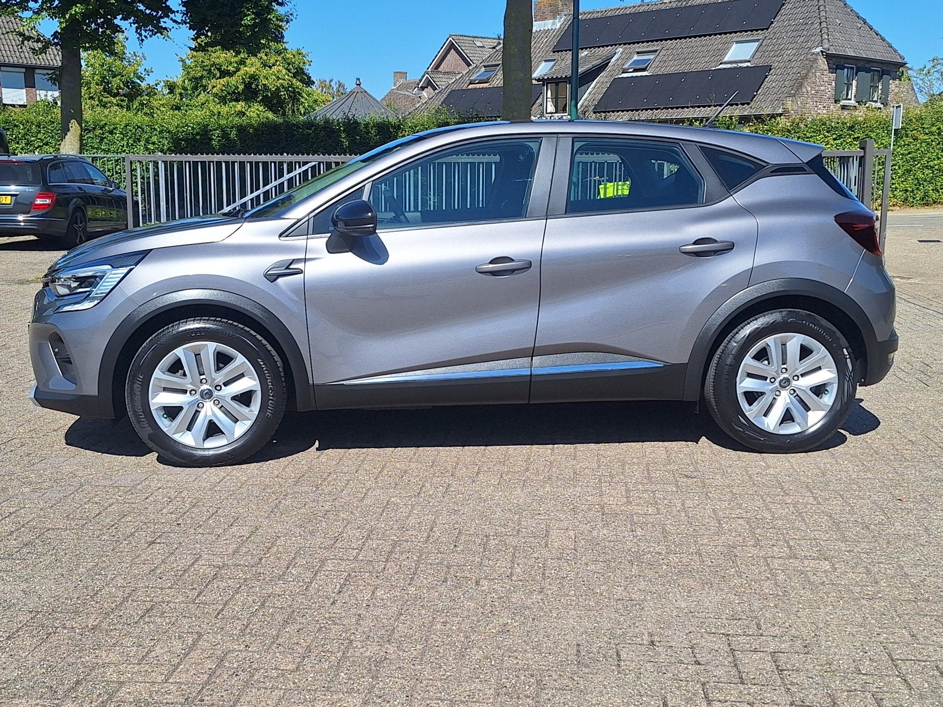 Renault Captur 1.0 TCe 100 Zen Navigatie / Airco / Cruise Co, Auto's, Voorwielaandrijving, Dealer onderhouden, Gebruikt, 1165 kg