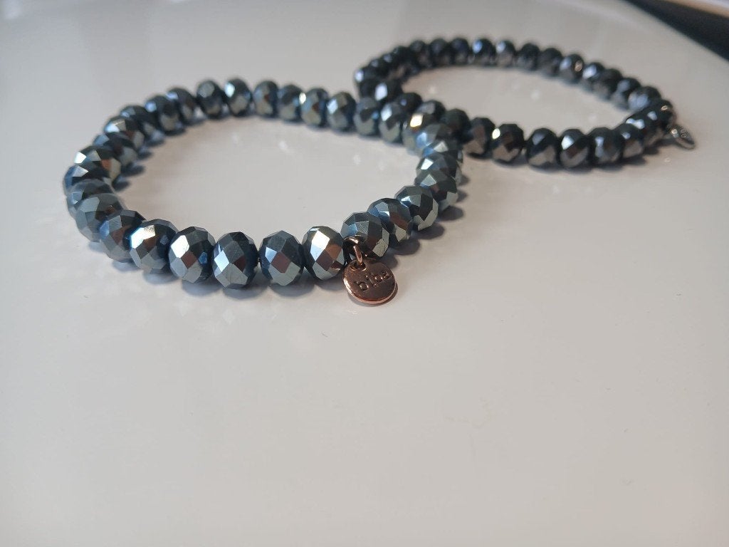 Armbanden Biba donkergrijs, Ophalen of Verzenden, Zo goed als nieuw, Grijs, Kunststof of Plastic