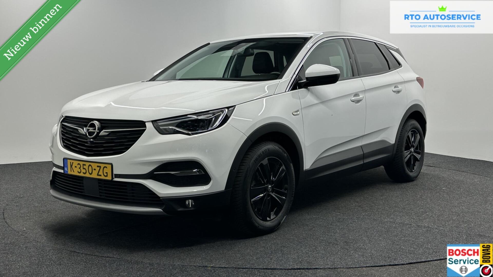 Opel Grandland X 1.2 Turbo Business Elegance TREKHAAK NAVI E, Auto's, Voorwielaandrijving, Gebruikt, 1199 cc, Met garantie (alle)
