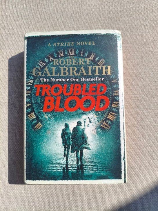 Troubled Blood - Robert Galbraith (Hardcover), Ophalen of Verzenden, Zo goed als nieuw, Robert Galbraith
