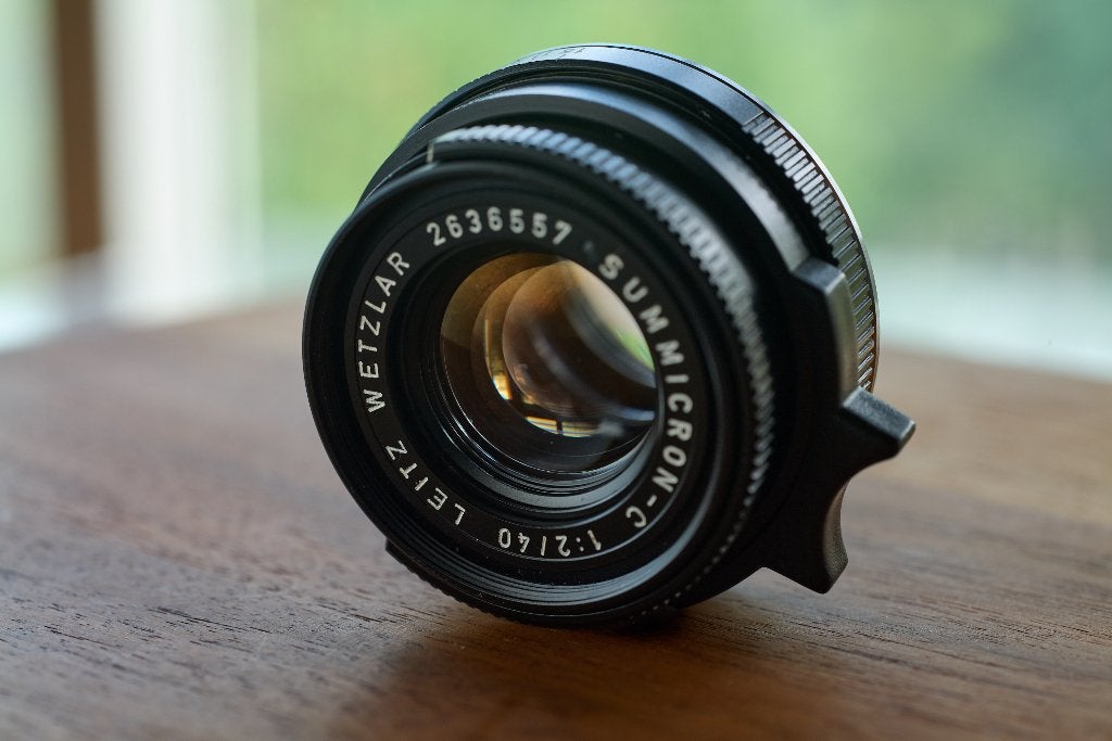 Leica summicron-c 40mm als nieuw, focus tab, extra zonnekap+, Audio, Tv en Foto, Fotocamera's Analoog, Ophalen of Verzenden, Zo goed als nieuw