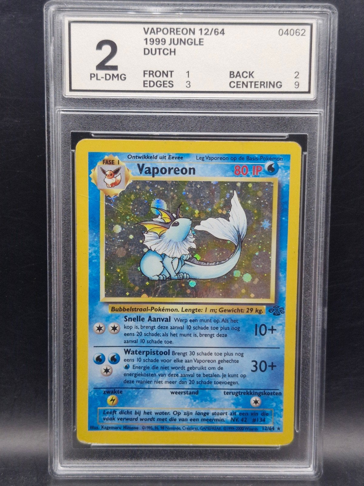 Vaporeon 1999 base jungle #12 woetoe Grading 2, Verzenden, Zo goed als nieuw, Losse kaart