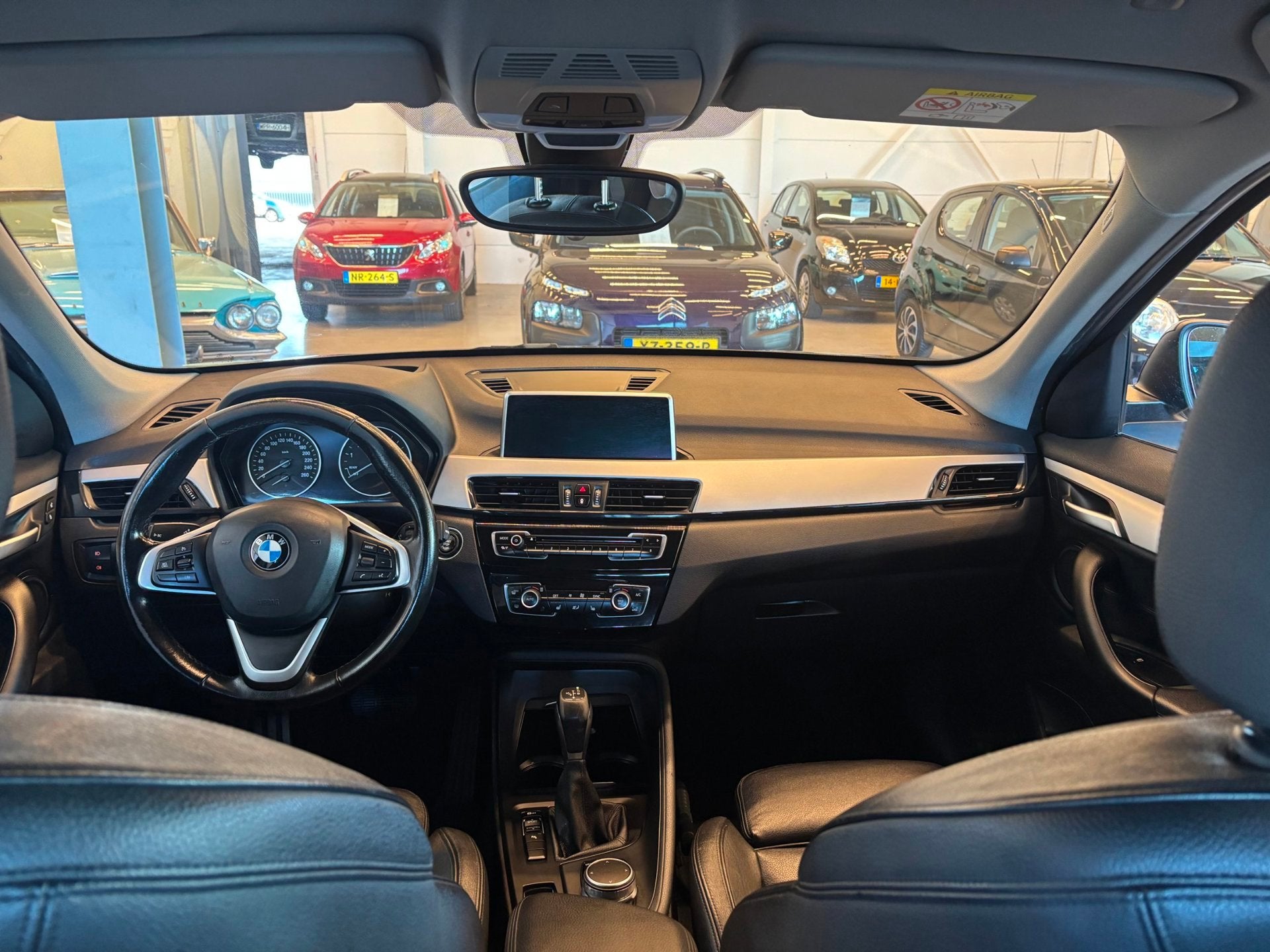 BMW X1 sDrive18i High Executive | Automaat | HUD | Leder | A, Dealer onderhouden, 136 pk, Gebruikt, 19 km/l