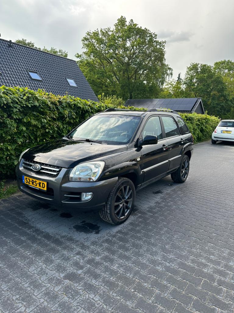 Kia Sportage 2.0 2WD 2005 Zwart, Trekhaak, DAB+, Airco, 1442 kg, Zwart, 4 cilinders, Zwart