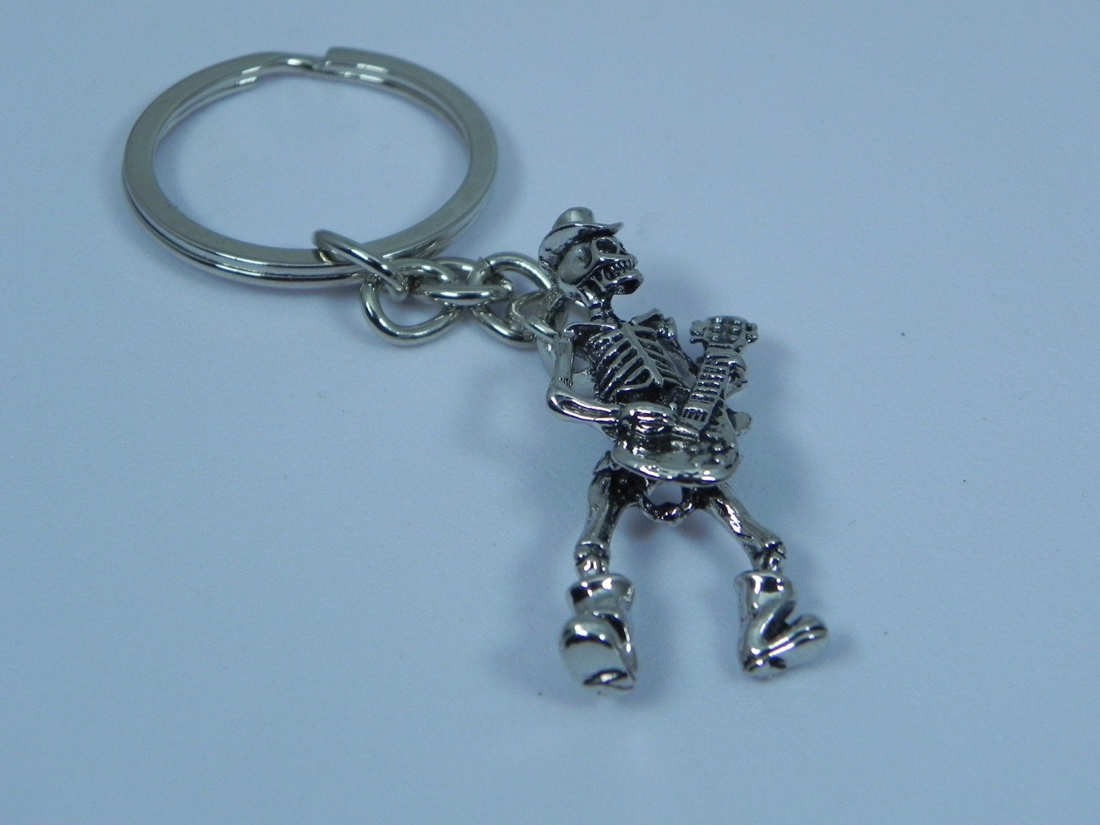 Leuke Skull met elektrische gitaar sleutelhanger, Verzenden, Nieuw, Overige typen
