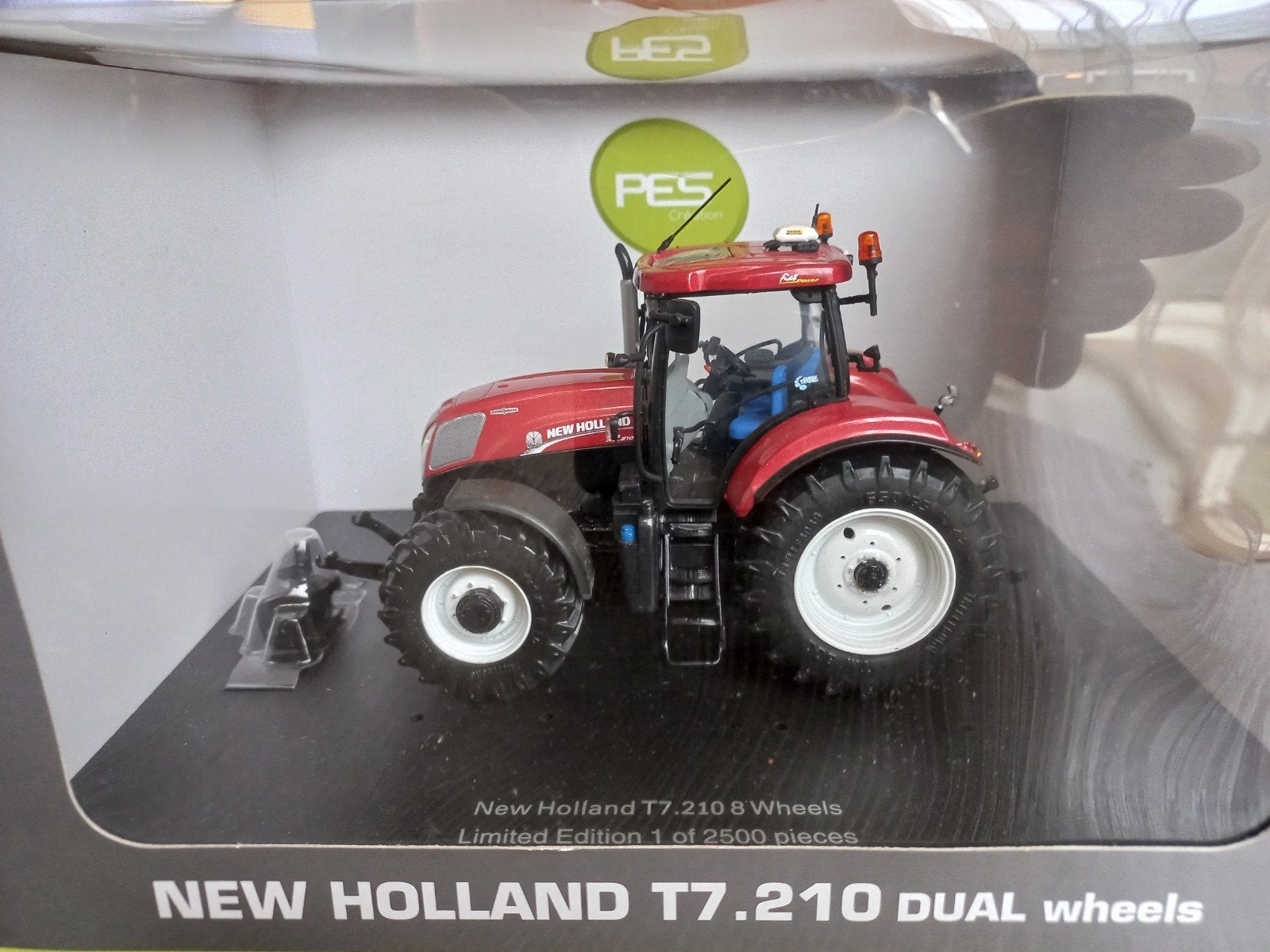New Holland T7.210 Terracotta UH, Hobby en Vrije tijd, Modelauto's | 1:32, Nieuw, Tractor of Landbouw, Universal Hobbies, Ophalen of Verzenden