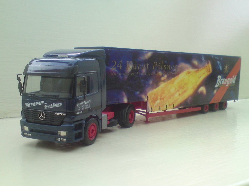 Herpa Mercedes Actros semi dieplader Braugold brauerei., Ophalen of Verzenden, Gebruikt, Bus of Vrachtwagen, Herpa
