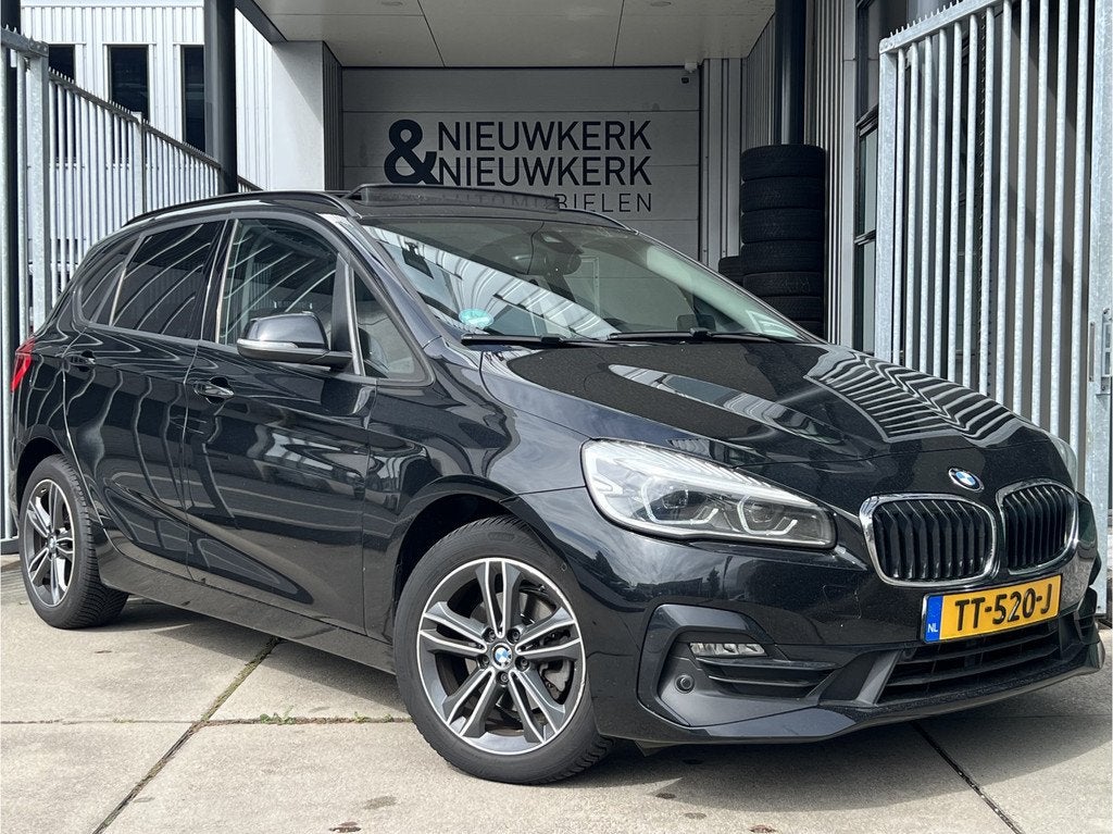 BMW 2 Serie Active Tourer 218i High Executive | AUTOMAAT | P, Auto's, BMW, Gebruikt, Met garantie (alle), Zwart, 3 cilinders