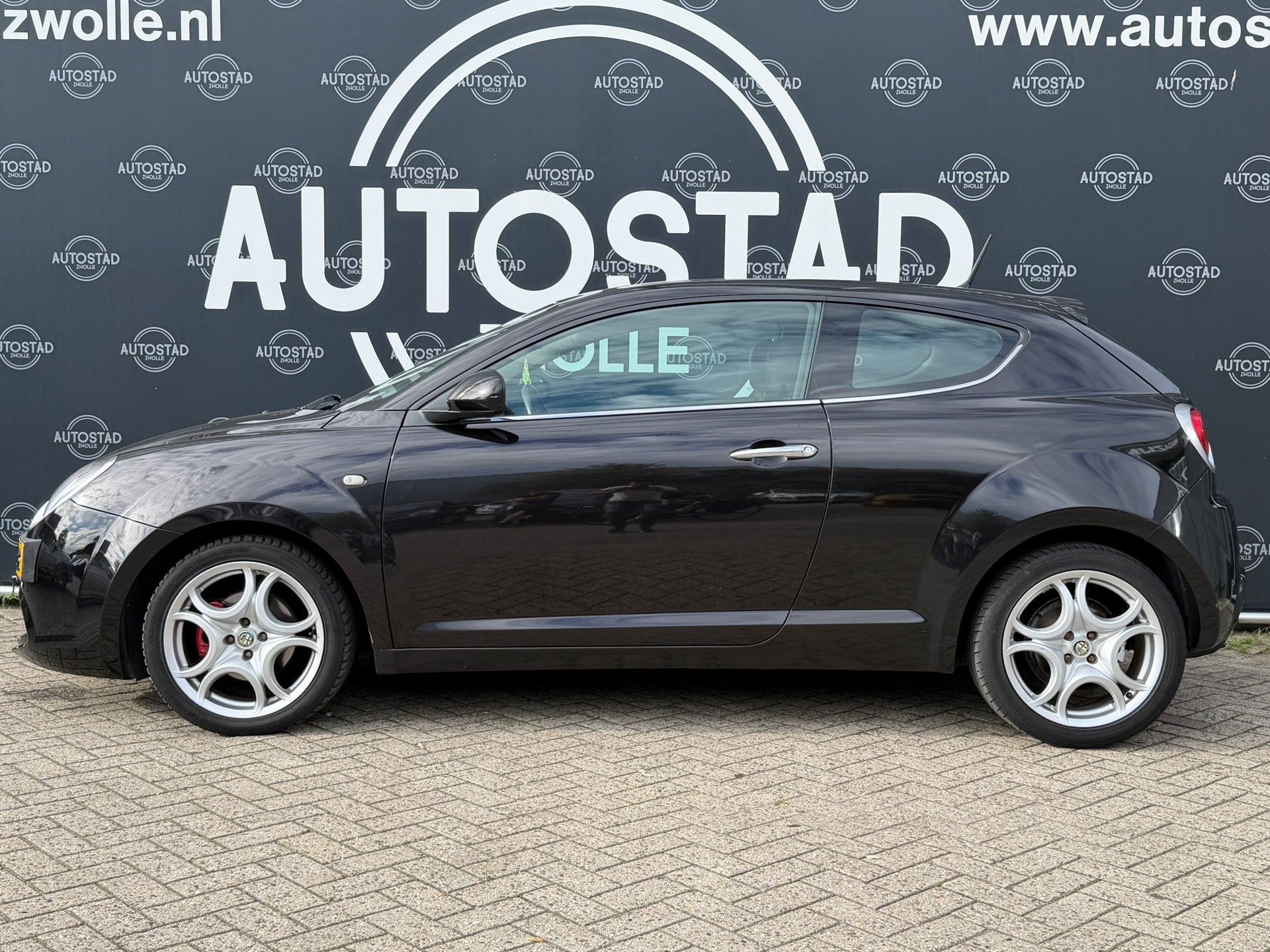 Alfa Romeo MiTo 1.4 T Distinctive NL-Auto / 2e Eigenaar / NA, Auto's, Voorwielaandrijving, Gebruikt, Zwart, 4 cilinders