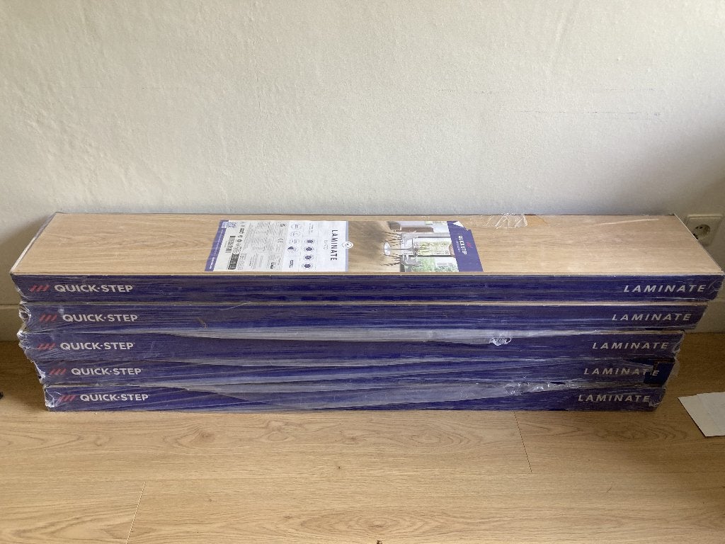 Quick-Step Nesto Laminaat - Nieuw in verpakking, Doe-het-zelf en Verbouw, Ophalen, Nieuw, 10 m² of meer, 10 tot 30 cm
