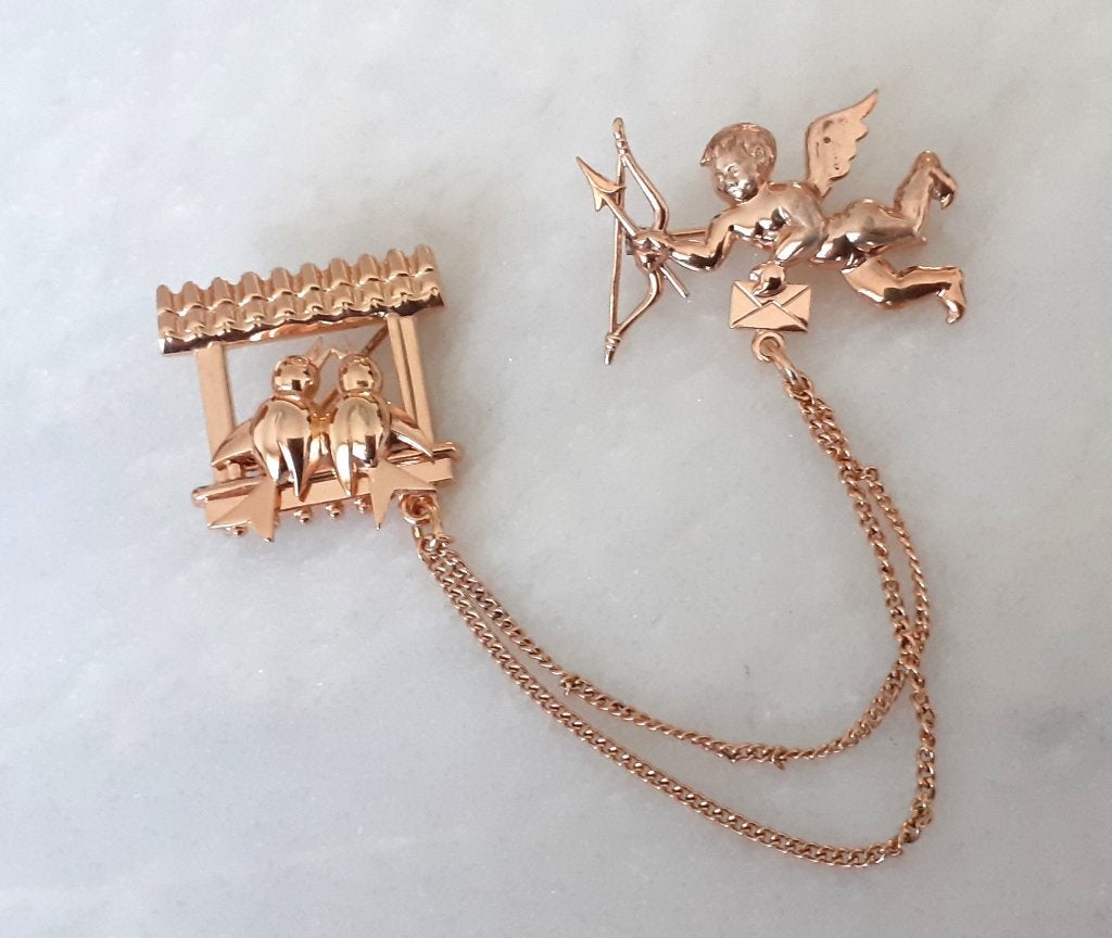 broche vintage engel en zwaluwen, Ophalen of Verzenden, Zo goed als nieuw, Goud, Overige materialen