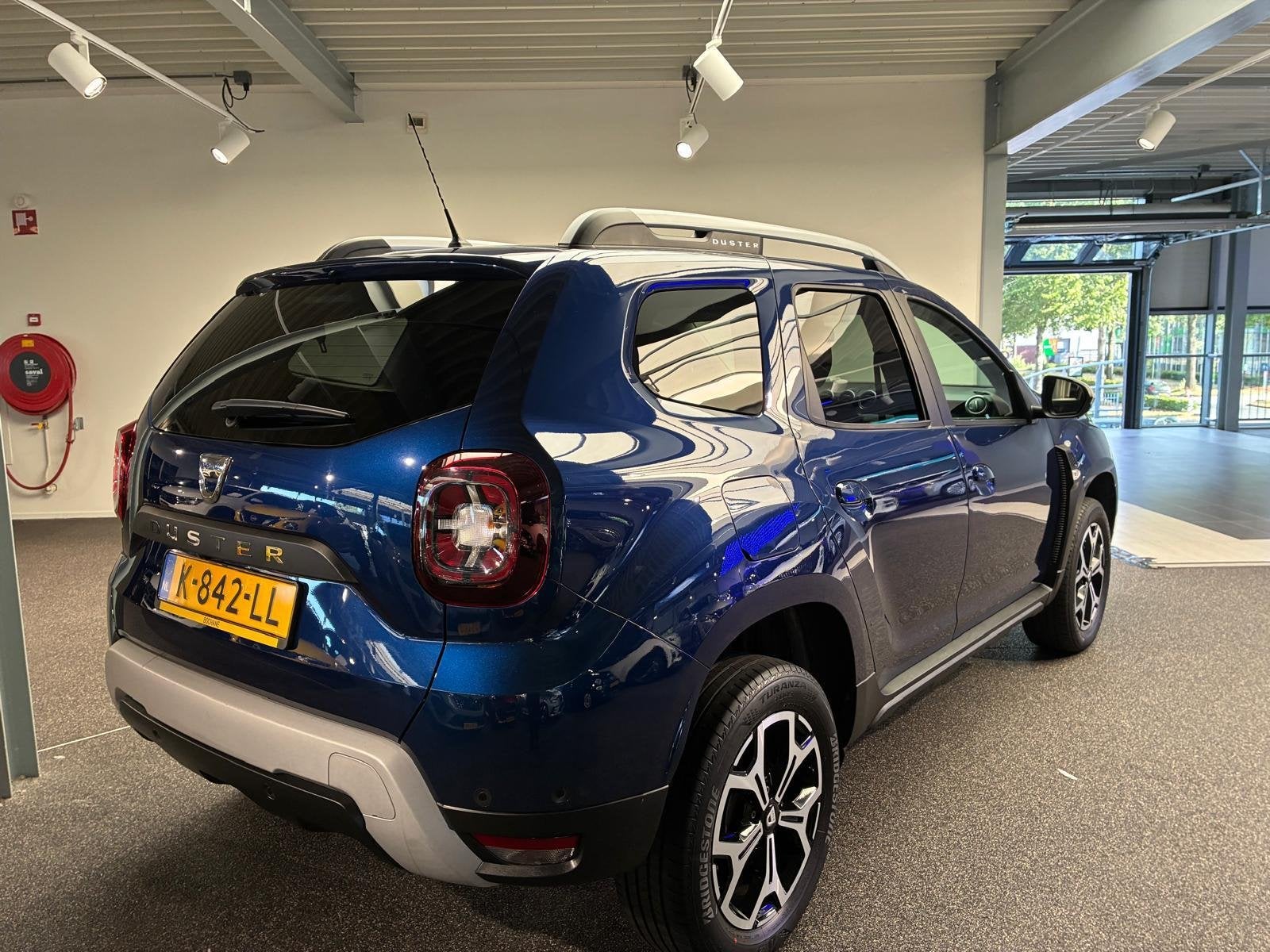 Dacia Duster 1.3 TCe Prestige | Cruise control | Camera | Na, Stof, Gebruikt, 4 cilinders, Blauw