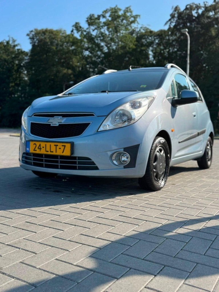 Chevrolet Spark 1.0 Bifuel 2010 Blauw, Auto's, Chevrolet, Voorwielaandrijving, Stof, Blauw, 68 pk